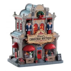 Negozio Nora's Christmas Boutique H 21 cm Edificio Illuminato Lemax - 85344